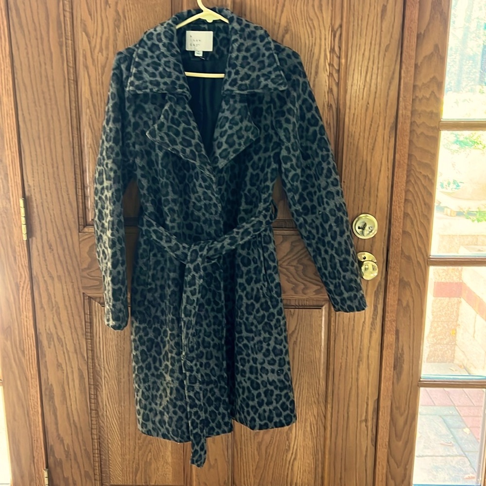 Grey leopard coat.